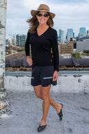 Golftini: Women's Black Side Pleat Performance Skort - Tornado