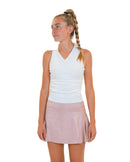 Lucky in “Leather” Skirt by Calliope Golf