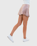 Lucky in “Leather” Skirt by Calliope Golf