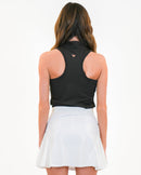 Lucky in “Leather” Skirt by Calliope Golf