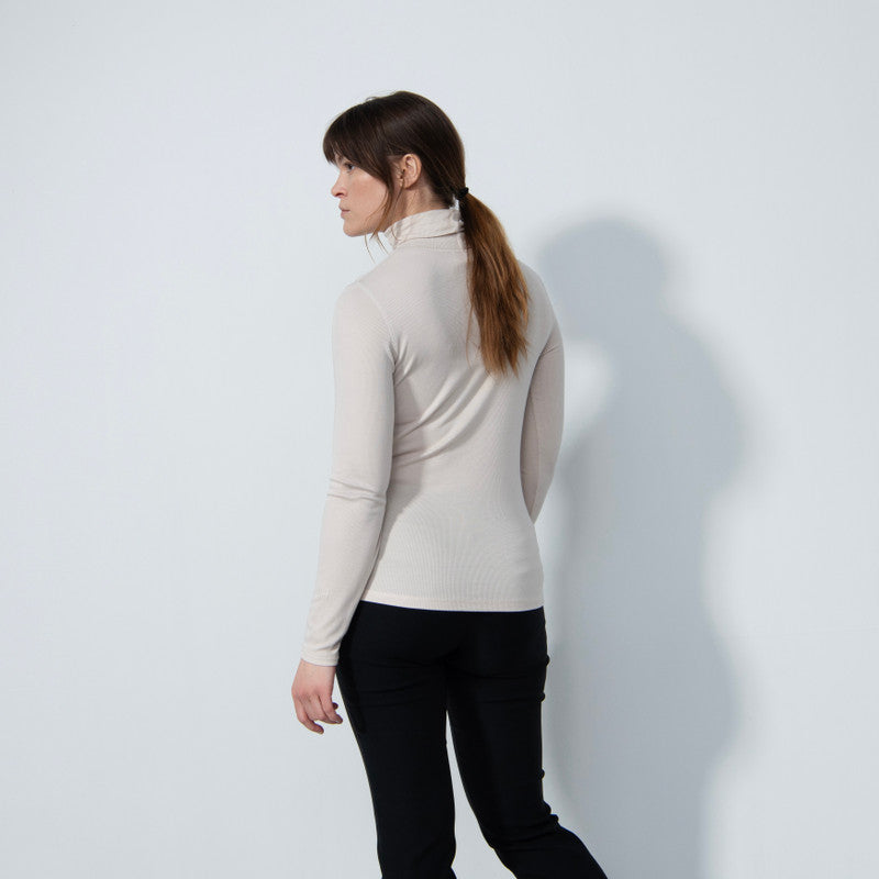 Daily Sports: Women's Ancona Long Sleeve Turtle Neck Top - Raw Beige